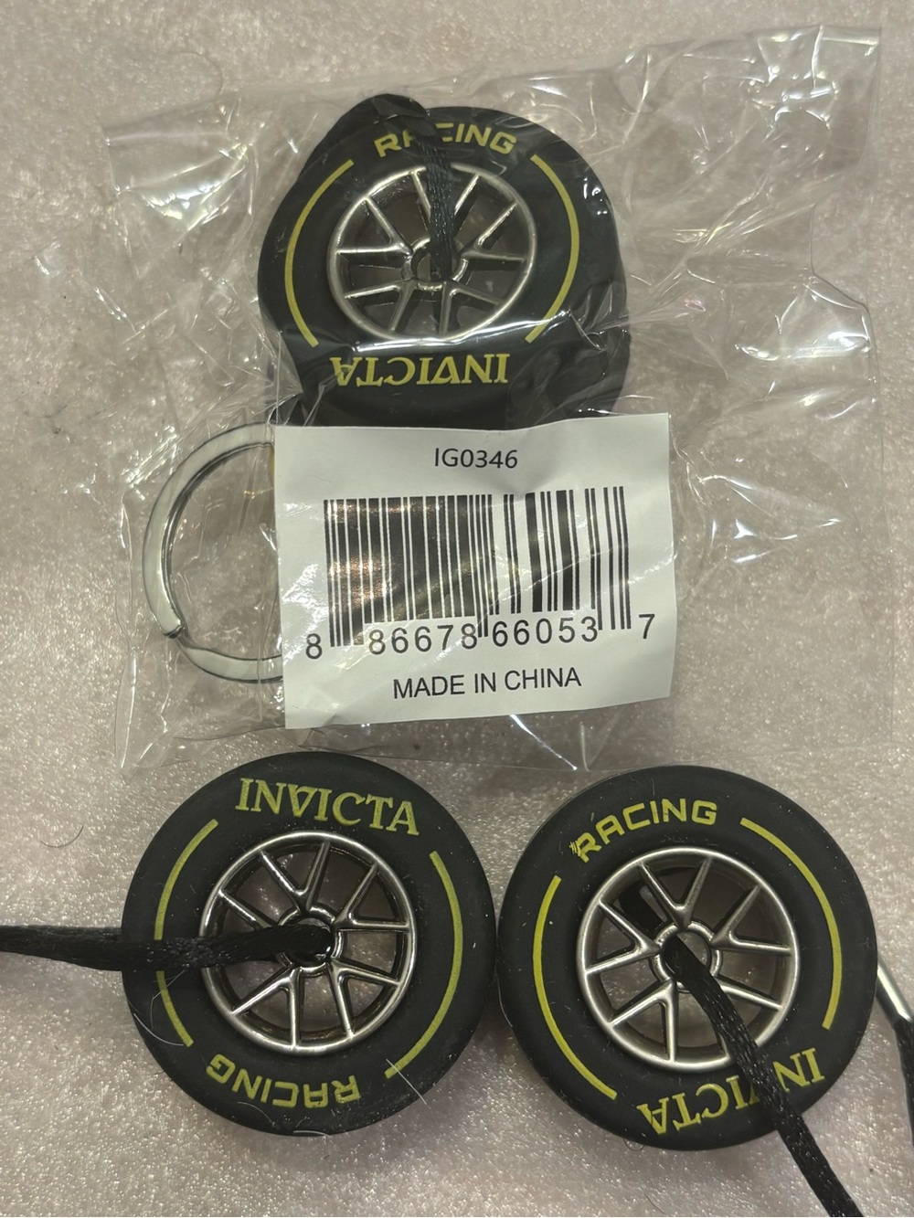 3 Invicta Black and Yellow Racing Tire Keychain Set